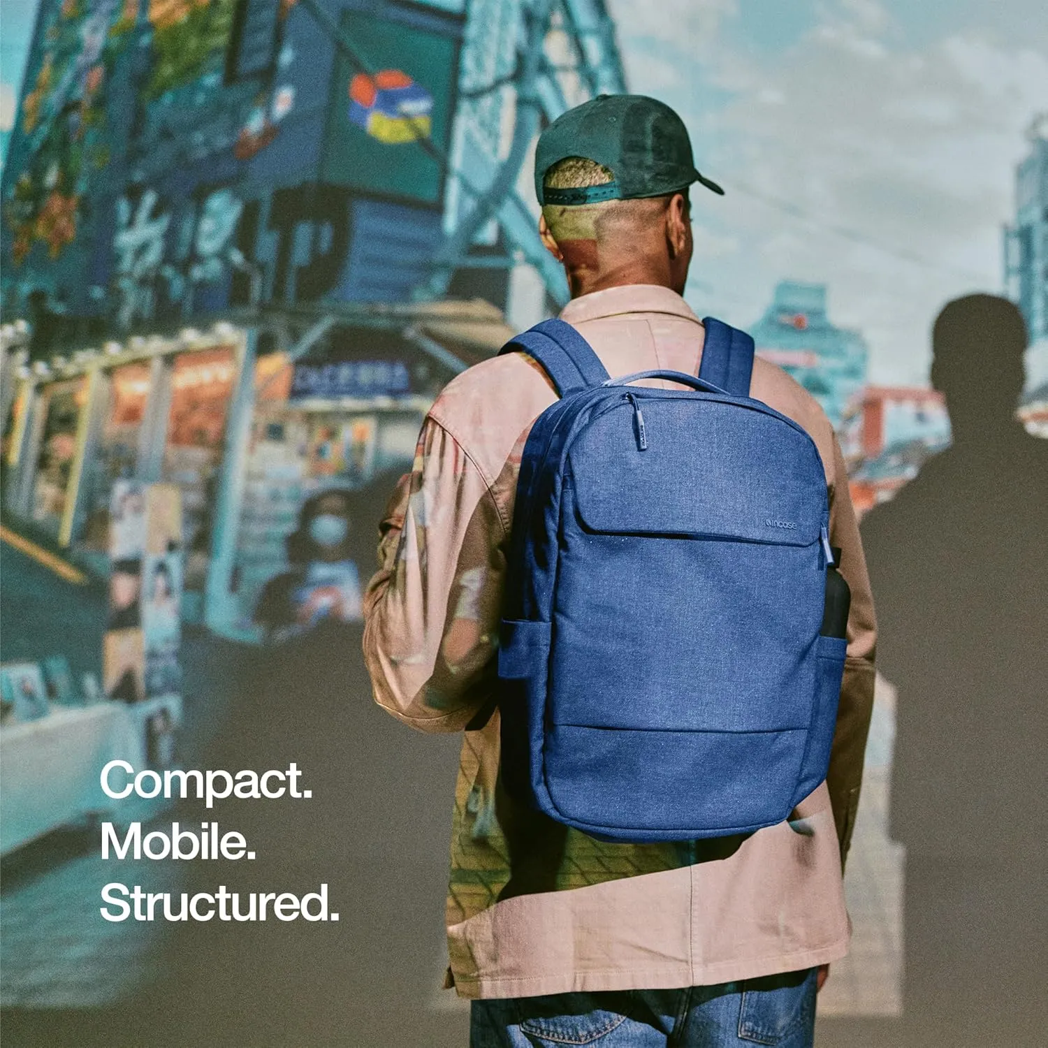 Incase Crosstown Backpack 20L  Durable Backpack Work, Travel & Daily Use  Faux Fur laptop pocket. External Zippered Pocket, Water Bottle Slips & Travel Pass-Through. Navy